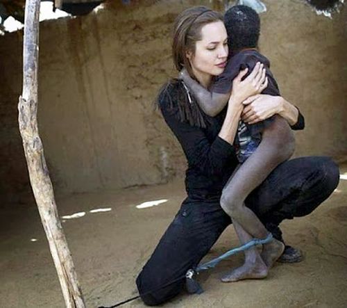 angelina jolie hugs african child with nodding disease